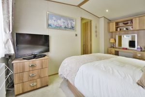 Master bedroom with dressing area- click for photo gallery